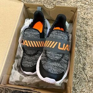 Never worn Under Armor Kids shoes